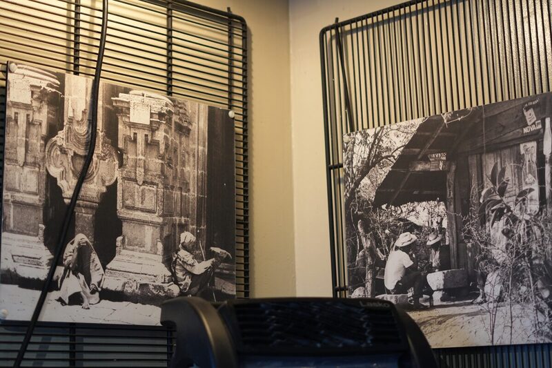 Framed black and white photographs hanging inside the restaurant