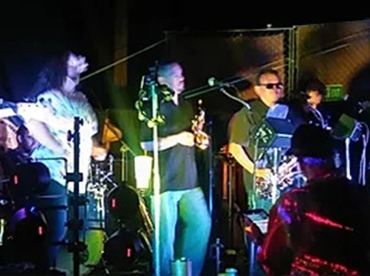 A band performing on stage